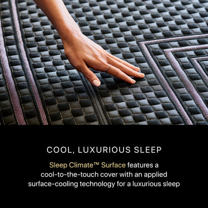 A hand rubbing on a BeautyRest Plush Hybrid mattress || series: Series Two || feel: Plush
