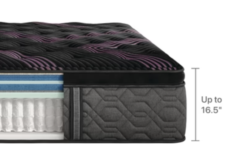 Cross-section of a premium mattress with a quilted black top featuring purple wave accents, multiple comfort layers, and pocketed coils, measuring up to 16.5 inches in height.