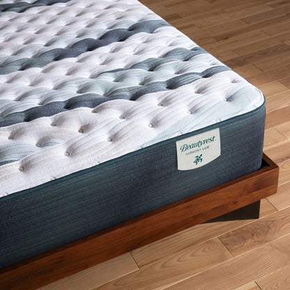 Corner view of the Beautyrest Harmony Lux mattress in a bedroom || series: Exceptional Coral Island || feel: extra firm