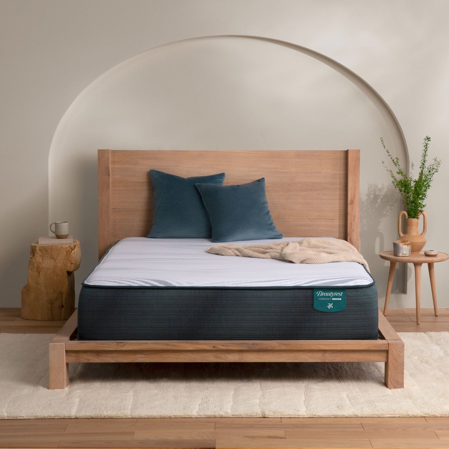 The Beautyrest Harmony hybrid Exceptional Driftwood Bay mattress in a bedrooom|| series: Exceptional Driftwood Bay || feel: plush