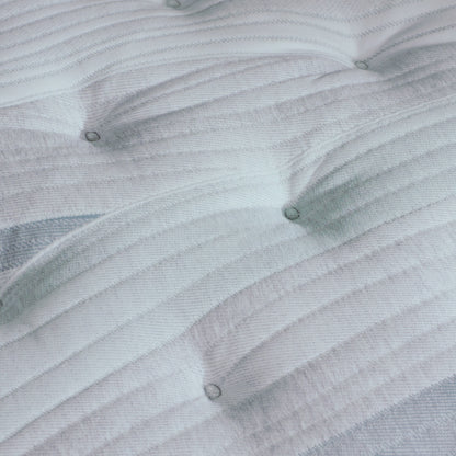 A hand pressing on the material of the Beautyrest Harmony Lux mattress || series: Premier Anchor Island || feel: plush pillow top