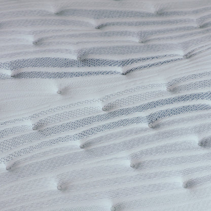 A hand pressing on the material of a Beautyrest Harmony mattress|| series: Exceptional Cypress Bay || feel: extra firm